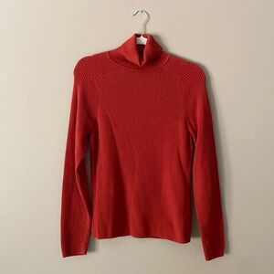 Pria, beautiful turtleneck sweater.